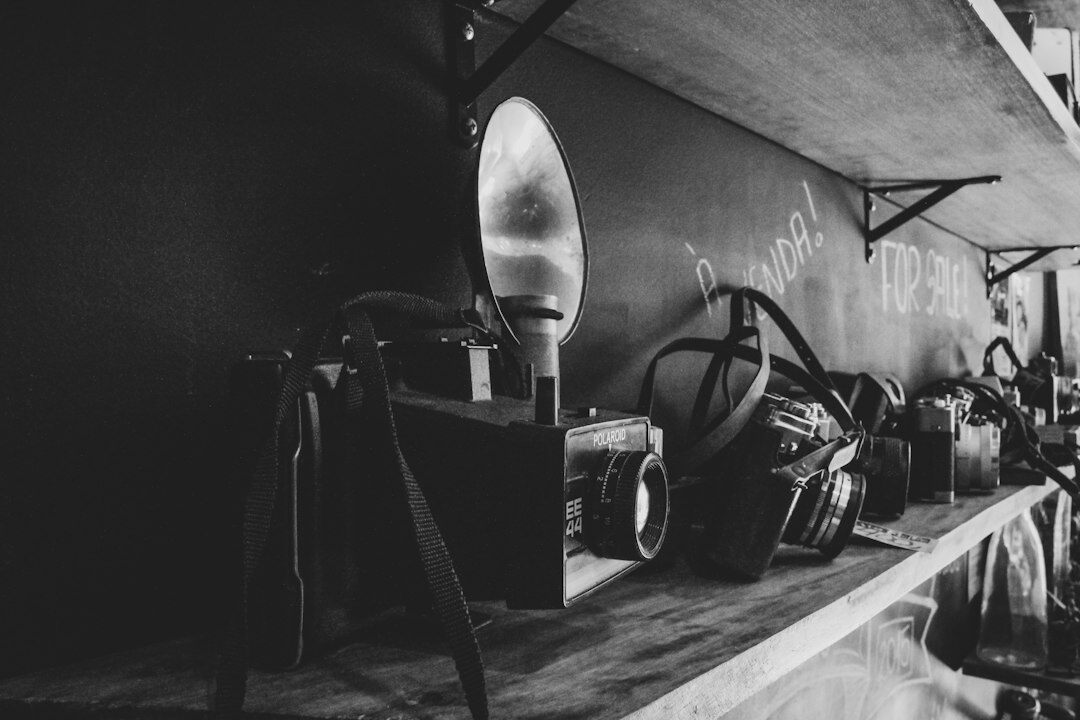 Vintage film camera and studio lighting equipment on set